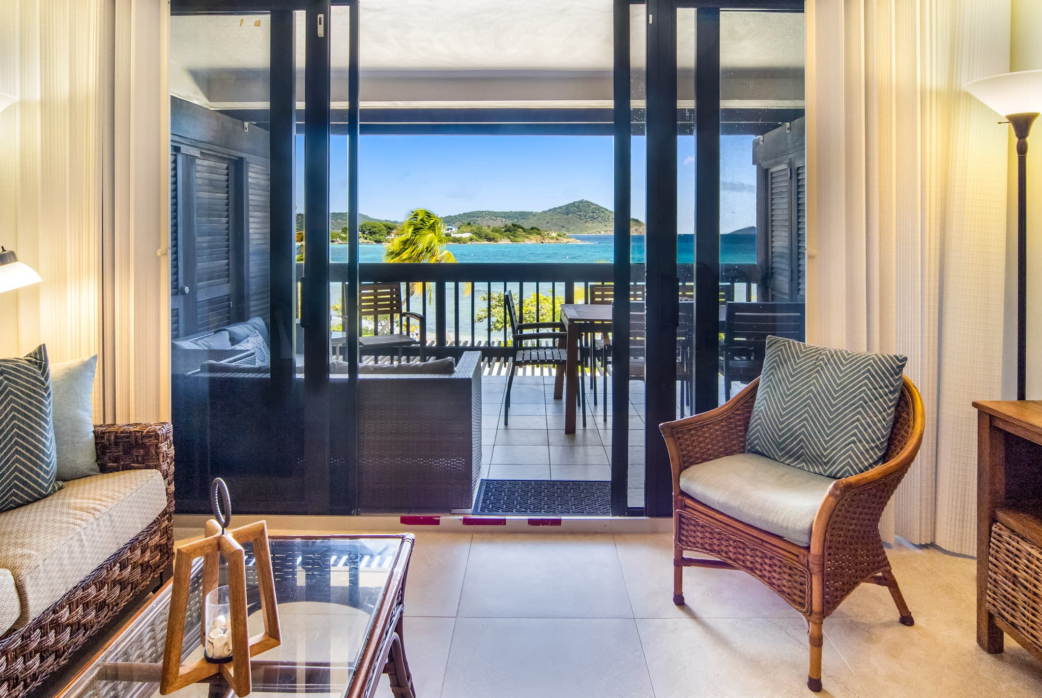 Sea view through the balcony doors at Sapphire Beach Villa