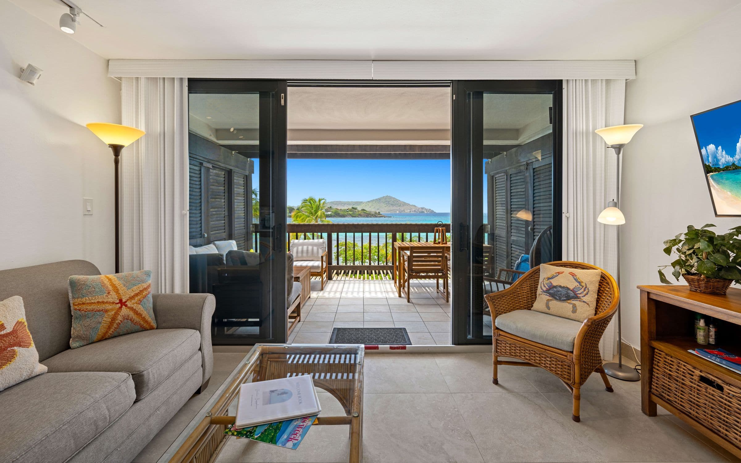 Sea view through the balcony doors at Sapphire Beach Villa